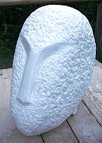 A head carved from marble